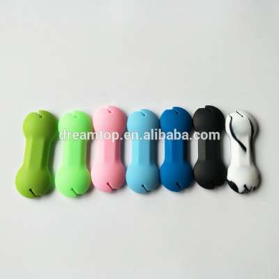 High quality bone shape silicone headphones silicone cable winder,cord wrapper winder for earphone